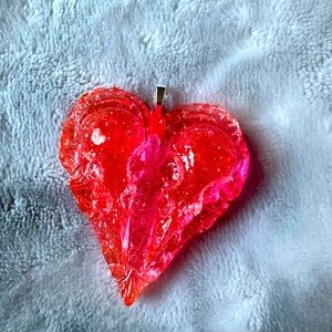 Handcrafted bird skull heart necklace